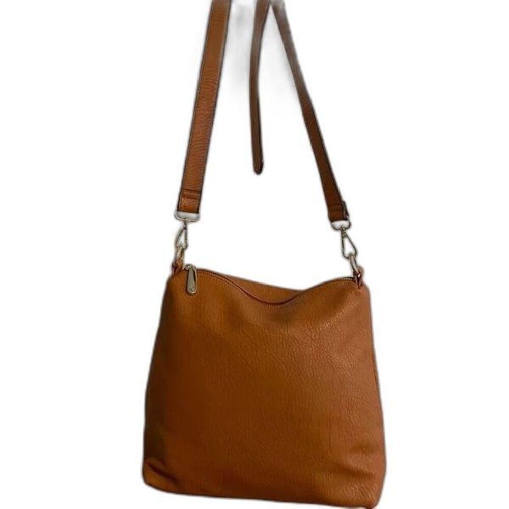 Charming Charlie tan Crossbody bag with adjustable strap EUC